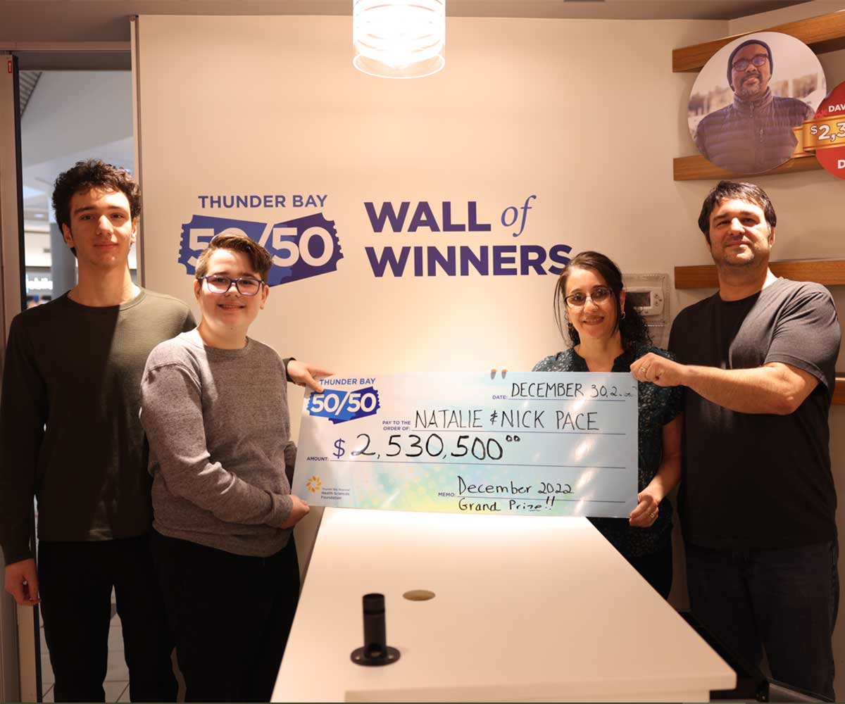 Natalie and Nick Pace and family with their cheque &mdash; $2,530,500 Thunder Bay 50/50 Grand Prize, December 2022